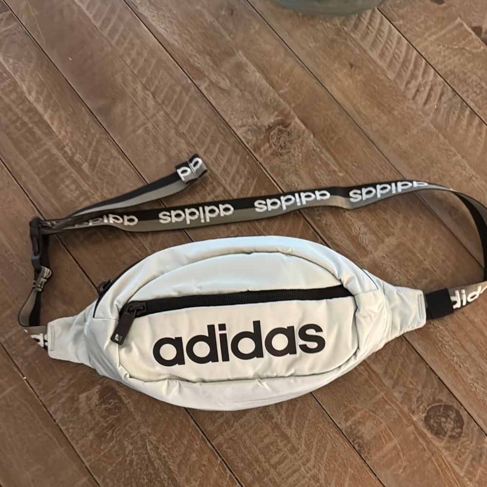 NWOT, Adidas logo waist bag in sea foam green .